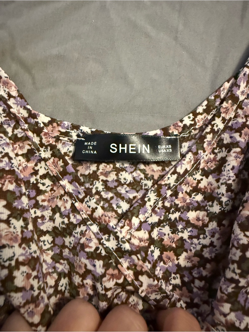 Dress neckline with label